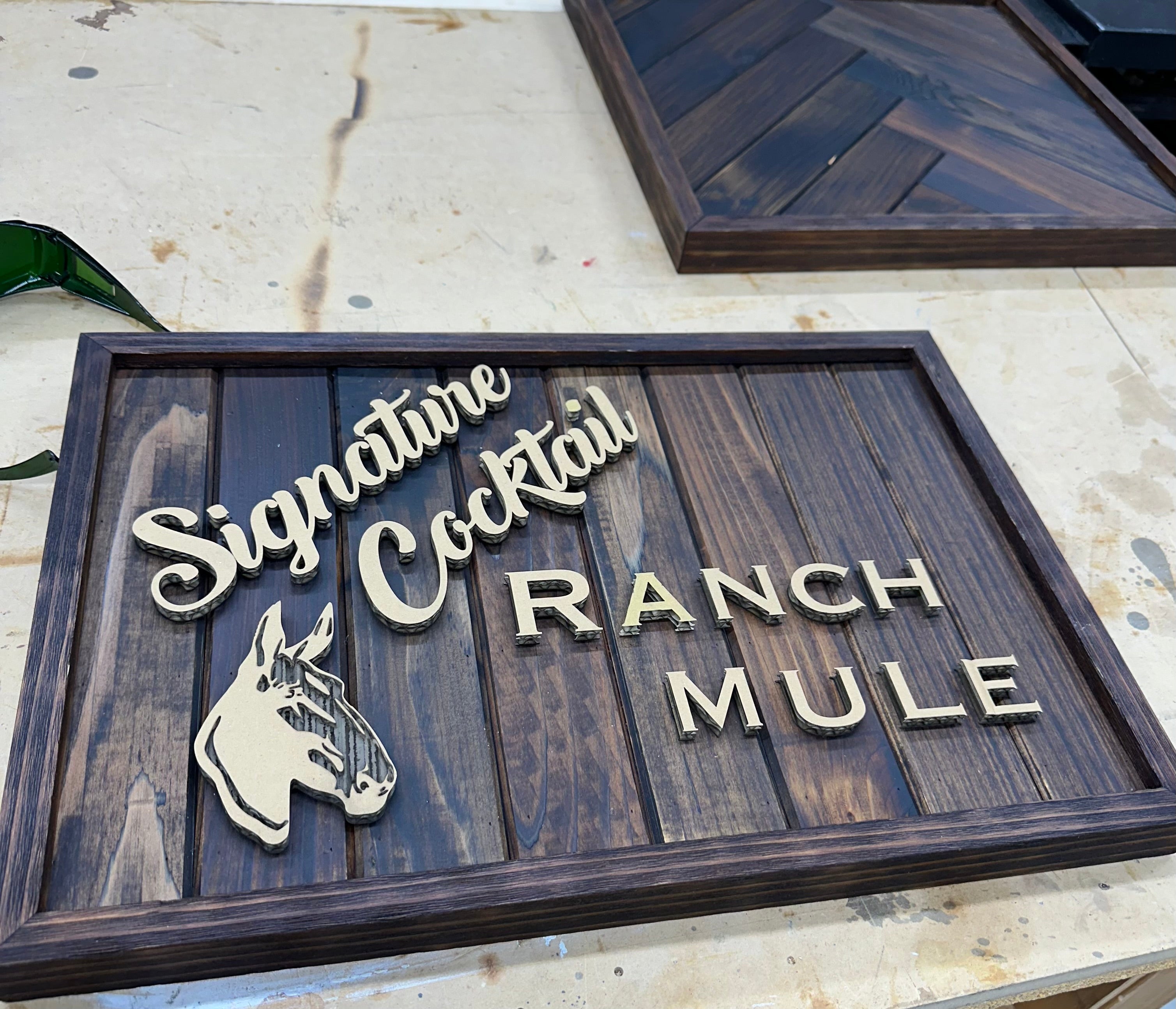 Elevate your home bar or decor with our exquisite collection of custom signs. Personalize your space with unique designs, including family names, favorite quotes, or personalized messages. Crafted from high-quality materials like wood, metal, or acrylic, our signs add a touch of personality and style to any room. Ideal for gifts or enhancing your own space, these custom signs are sure to make a statement. Shop now and create a personalized touch for your home bar or decor.