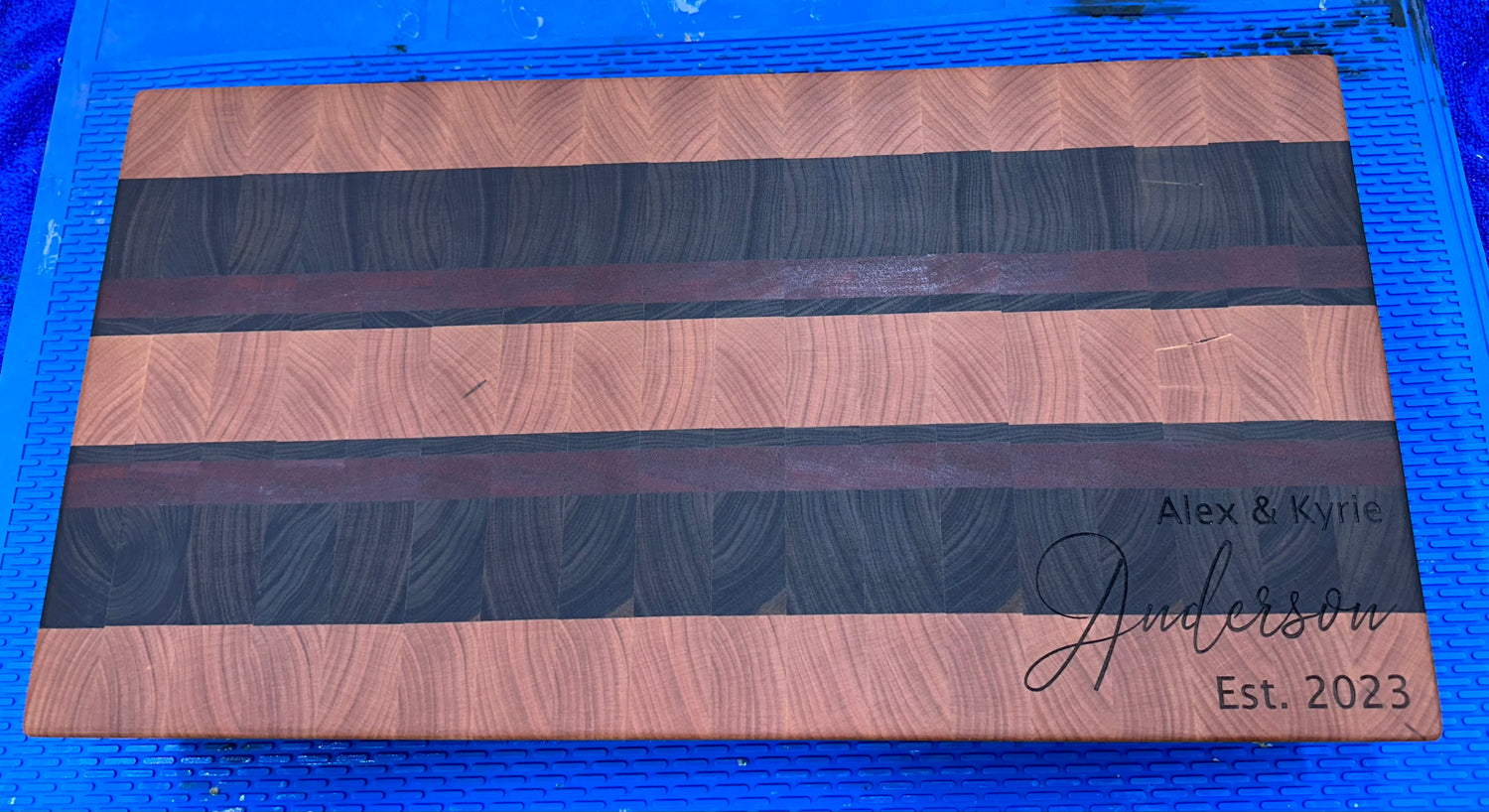 Custom End-Grain cutting board with a customized engraving for a wedding gift. 