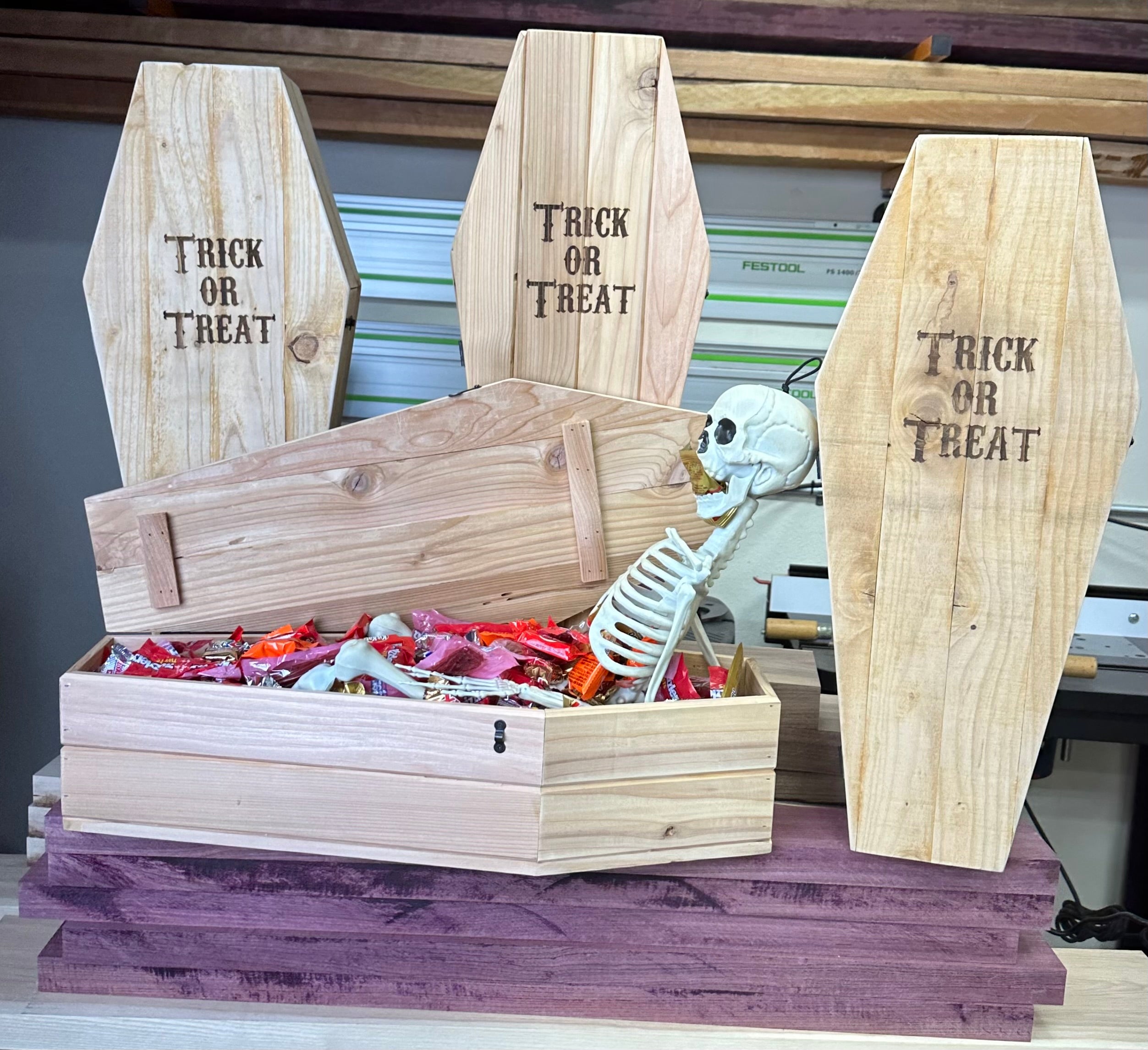 Spook up your Halloween decor with our unique wooden candy coffin. Crafted from durable wood, this coffin-shaped candy holder adds a touch of eerie charm to your festivities. Fill it with your favorite Halloween treats and watch as it becomes a hauntingly delightful centerpiece. Perfect for parties or as a fun addition to your Halloween decorations. Get ready to delight trick-or-treaters and guests alike with our wooden candy coffin.