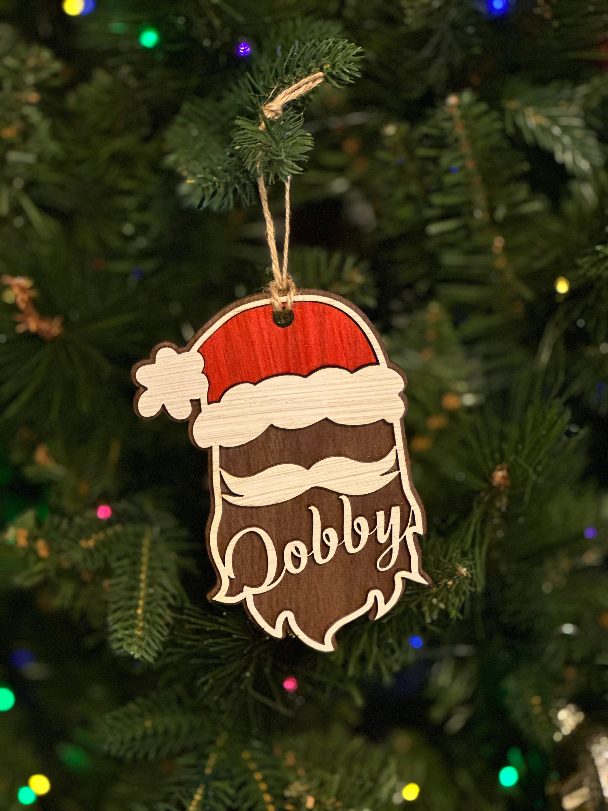 Celebrate your loved ones and cherished friends with this personalized Santa ornament. This adorable ornament is available for personalization with no extra cost.  After you check out, visit our Custom Order Page to fill out what personalized name you would like to request on this page. If you do not hear from you within 72 hours, We will contact you to receive your personalization request. 