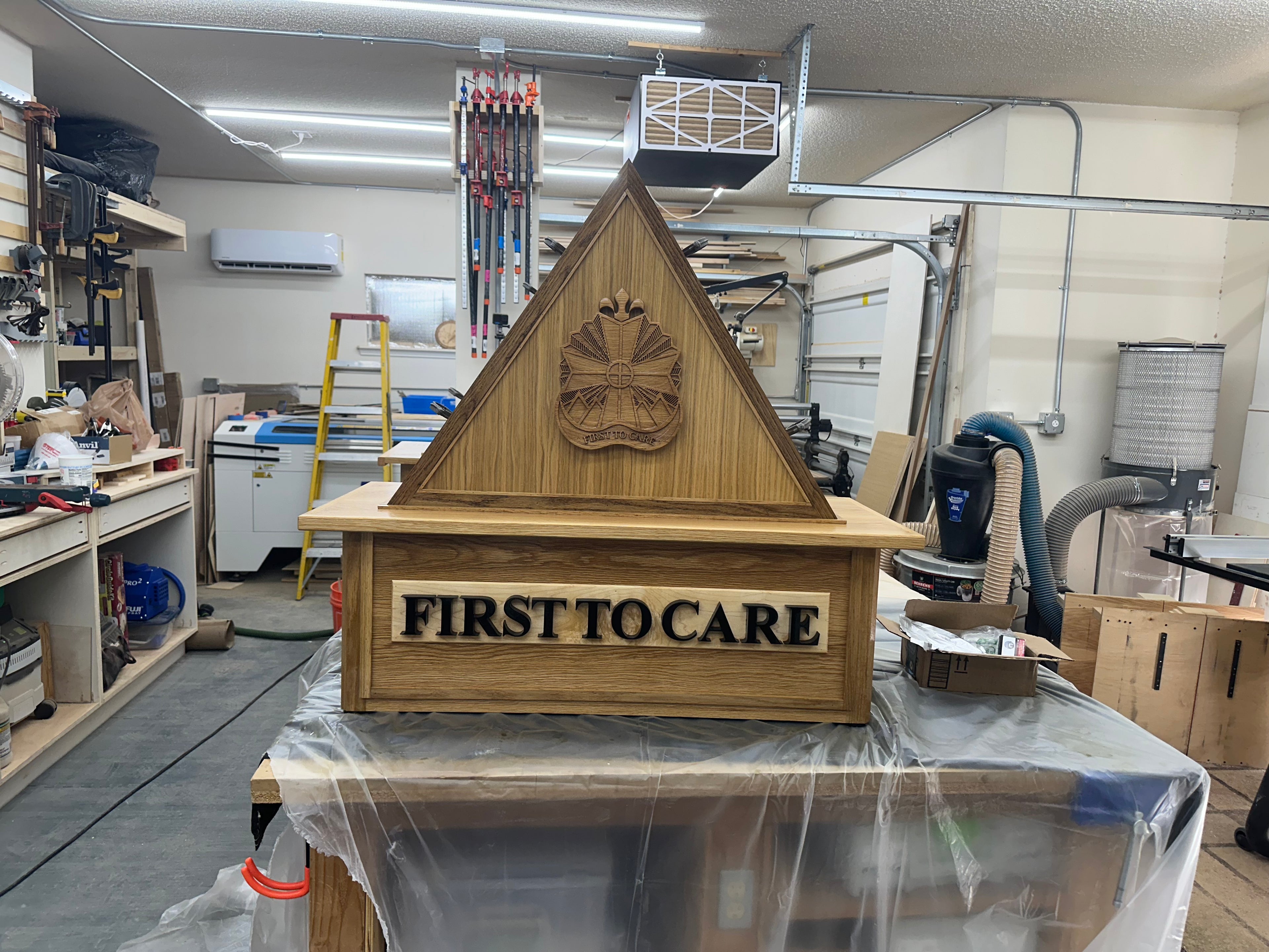 Custom Flag Holder for a US Army unit in Fort Bliss, Texas. This is a solid white oak piece with a custom 3D carve and 3D Lettering.